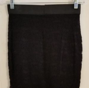 A black lace skirt